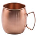 A Clipper Mill brushed copper Moscow Mule mug with a handle.
