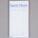 A white carbonless guest check with blue lines and writing.