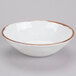 A white melamine bowl with brown speckled rim.