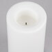 A white Sterno flameless outdoor banquet pillar candle.