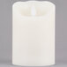 A Sterno Mirage LED candle with a white flame.