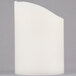A Sterno Mirage cream LED candle with a curved edge on a gray background.