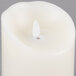 A white Sterno Mirage flameless LED candle with a white flame.