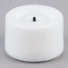 A white Sterno flameless wax votive candle.