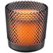 A Sterno gray flameless wax filled glass candle holder.