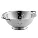 A close-up of a stainless steel Vollrath colander with handles and a base.