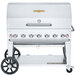 A silver stainless steel Crown Verity barbecue grill on wheels.