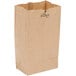 A brown paper bag with the word "Duro" on it.