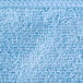 A close up of a blue Unger SmartColor Microfiber cleaning cloth.