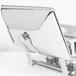 A stainless steel Vollrath Orion chafer cover holder with a silver handle.