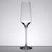 A close up of a clear Stolzle flute wine glass.