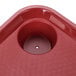A red polypropylene tray with cup holders in it.
