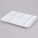 A white polypropylene tray with 6 compartments.