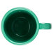 A GET Rainforest Green Tritan Mug with a handle on a white background.