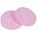 Two Medique Diotame pink pills with writing on them.