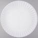 An American Metalcraft round white melamine plate with a wavy edge.