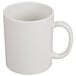 A white mug with an ivory handle.