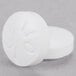 A close-up of a white Medi-First aspirin tablet.