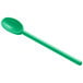 A green plastic spoon with a long handle.