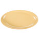 A close up of a yellow GET Osslo oval melamine platter.