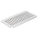 A white plastic drip tray grid with metal slats.