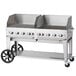 A Crown Verity stainless steel portable grill with a lid and wheels.