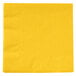 A folded yellow Creative Converting School Bus Yellow beverage napkin.