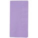 A close-up of a Creative Converting Luscious Lavender purple paper napkin with a white border