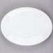 A bright white Libbey porcelain platter with a rolled edge.