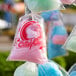 A group of Carnival King cotton candy bags with a printed design.
