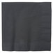 A close-up of a black Creative Converting 2-ply luncheon napkin with a folded edge.