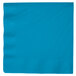 A turquoise blue paper napkin with a white background