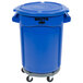 A blue Rubbermaid BRUTE trash can with wheels and a lid.