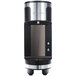 A black and silver Bunn Refresh Countertop water dispenser with push button controls.