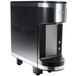 A black and silver Bunn Refresh Countertop water dispenser with push button controls.
