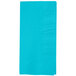 A blue paper napkin with a white border.