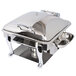An Eastern Tabletop stainless steel chafer with a hinged dome lid on a silver tray.
