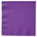 A Creative Converting amethyst paper napkin with a plain edge.