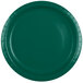 A close-up of a Creative Converting Hunter Green paper plate.