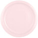 A close-up of a pink paper plate with a white background.