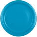 A close-up of a turquoise blue paper plate.
