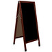 A cherry stained solid oak A-Frame with a black porcelain marker board.
