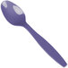 A purple plastic spoon.