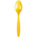 A School Bus Yellow heavy weight plastic spoon with a white background.
