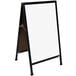 An Aarco black aluminum A-frame sidewalk sign with a white porcelain marker board.