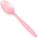 A close-up of a Creative Converting Classic Pink heavy weight plastic spoon.