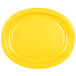 A yellow oval paper platter with a white circle on a white background.