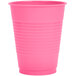 A Creative Converting Candy Pink plastic cup.