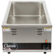 A stainless steel APW Wyott countertop warmer with classic hotwells.
