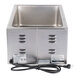 A stainless steel APW Wyott countertop food warmer with a black cord on a stainless steel counter.